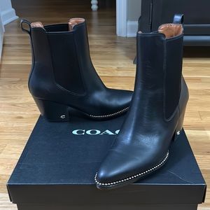 Black boot with beadchain, slip on. Only worn once